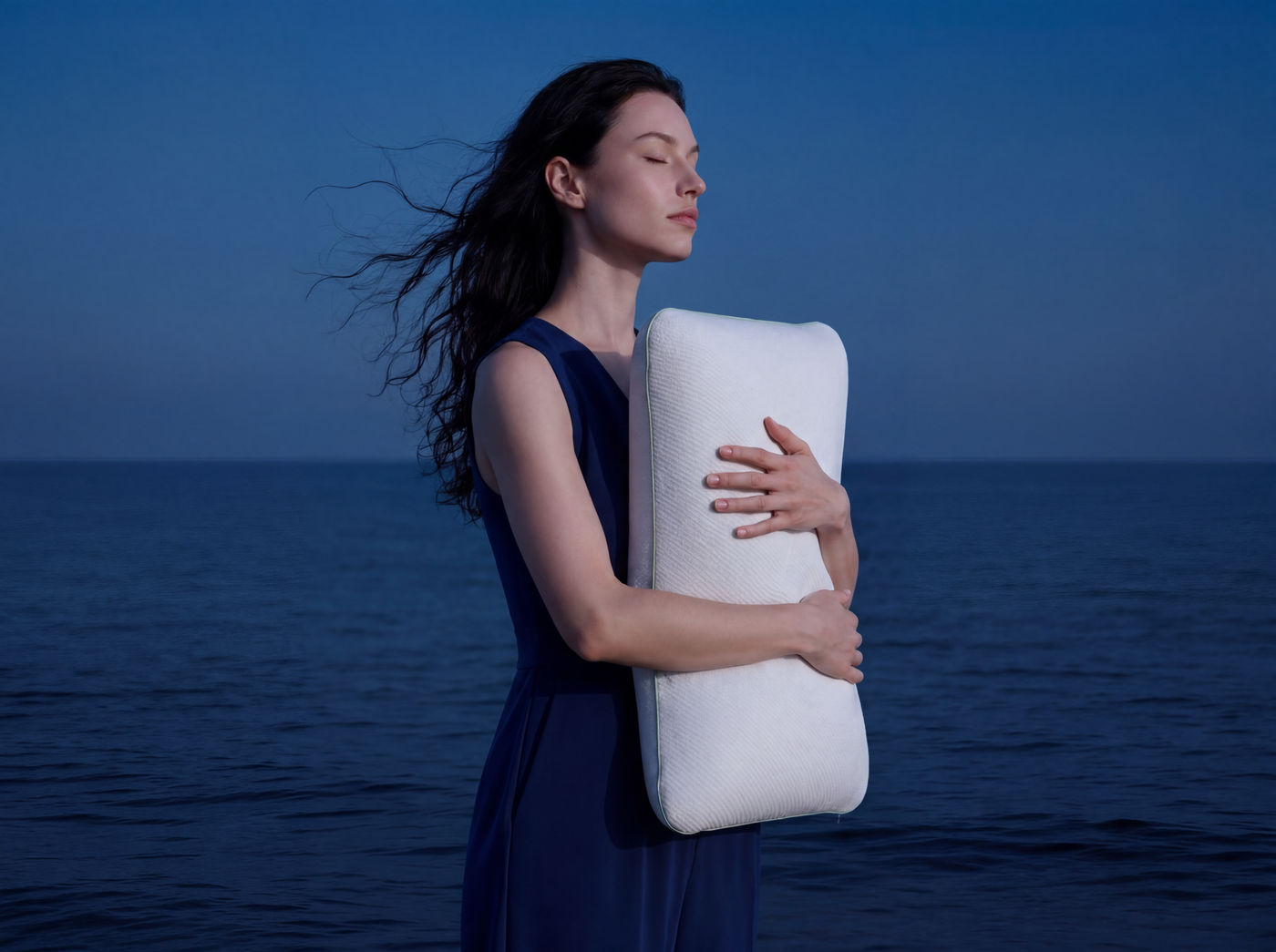 Close-up of MemoryOne Hybrid Pillow fabric and brand label