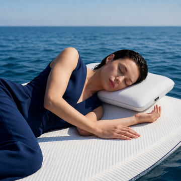 Overhead view of MemoryOne Hybrid Pillow on blue bedding